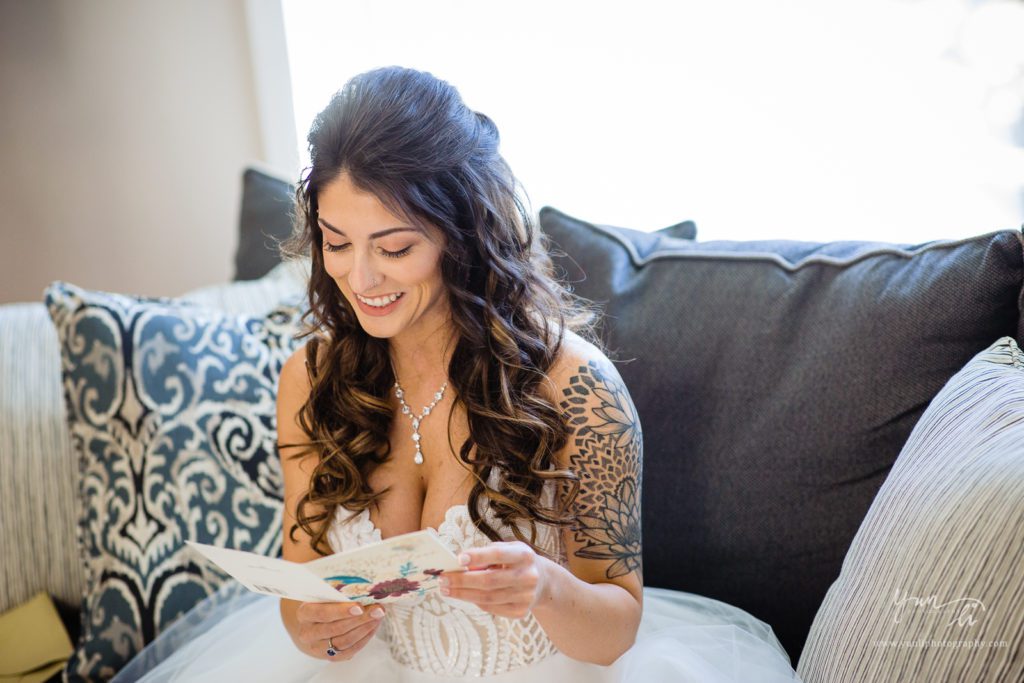 Bride reading letter from groom-Long Island Wedding Photographer-Yun Li Photography