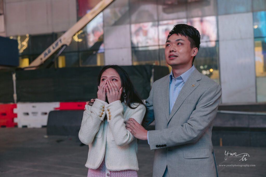 surprise marriage proposal at Time Square engagement pictures - New York Wedding Photographer