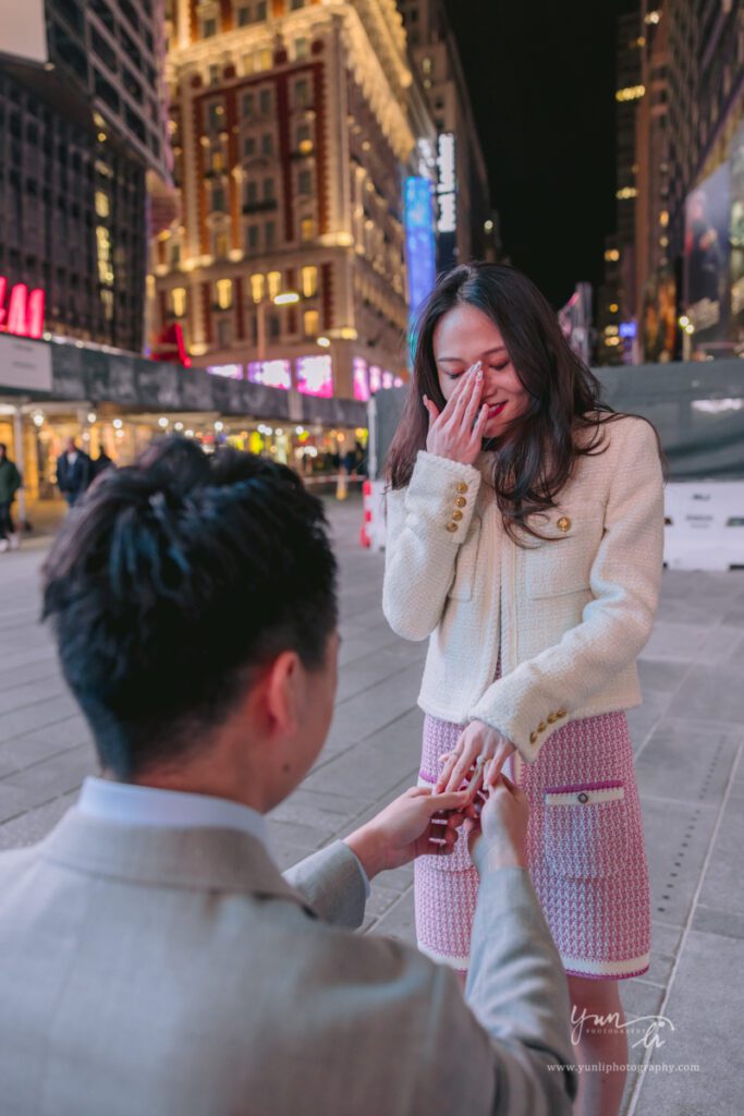 surprise marriage proposal at Time Square engagement pictures - New York Wedding Photographer