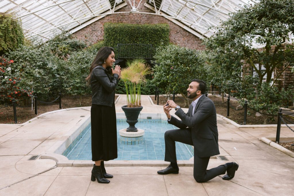 Surprise proposal/Engagement picture at Planting Fields - Long Island Wedding Photographer